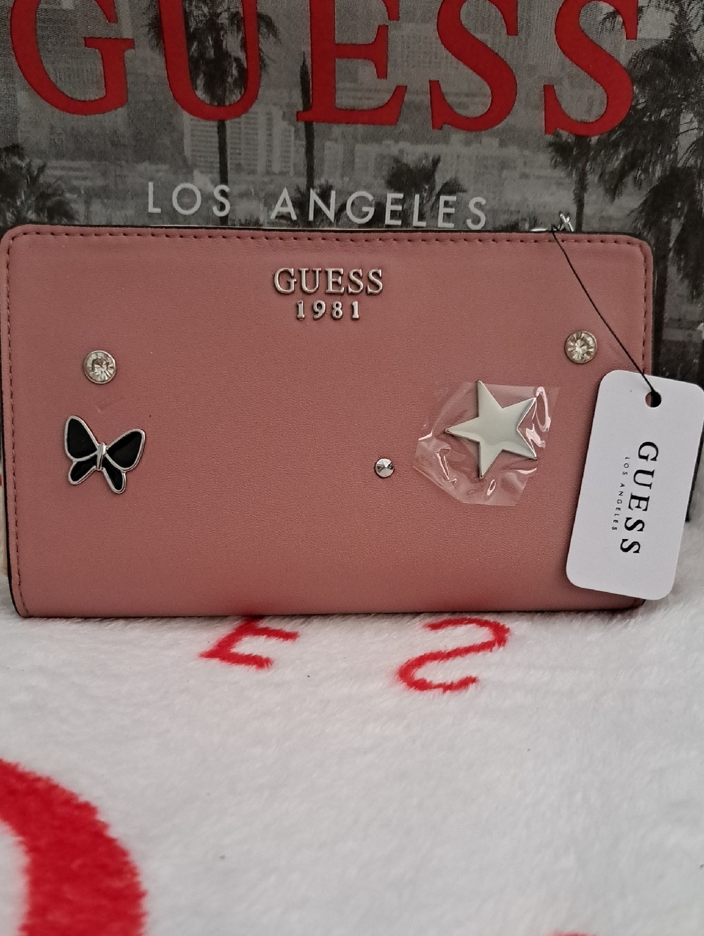 GUESS Pink Wallet with Star & Butterfly Accents